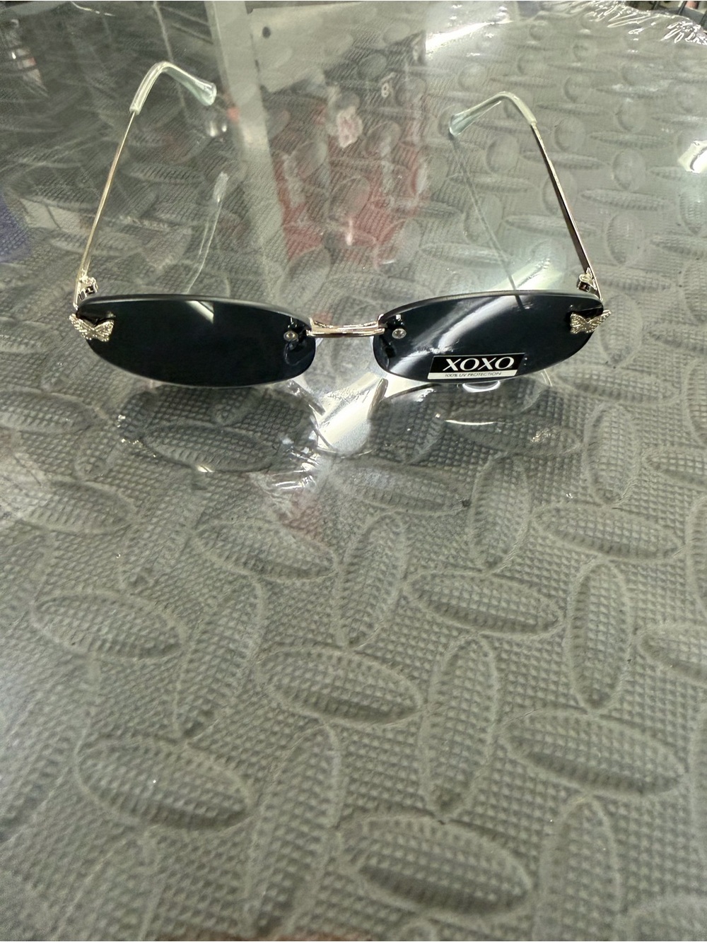 XOXO Women's Black Rimless Sunglasses with Gold Temples
